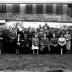 Groepsfoto bij café 'De Vrede', Izegem 1957