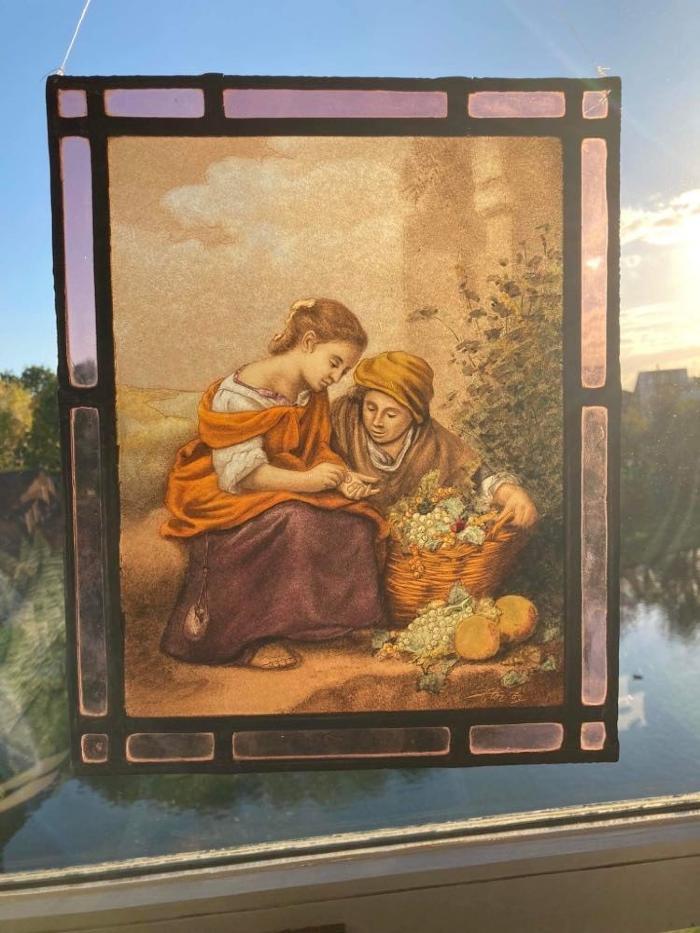 Glasraam met moeder en dochter