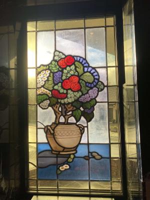 Rechthoekig glasraam met bloempot