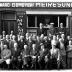 Groepsfoto voor café 'St.-Elooy' bij Ward Demeyer, Izegem 1957