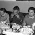 Kampioenviering boogschutters café 'Stad Kortrijk': kampioen aan tafel, Izegem 1957 