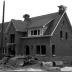 Woonhuis in opbouw: voor- en achtergevel, trap, Izegem 1958